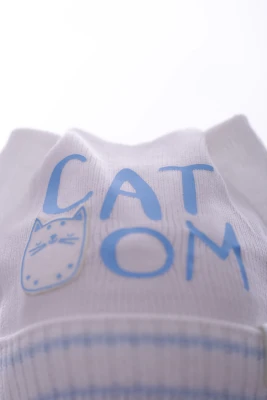 Шапка в'язка на трикотажі Котик блакитна