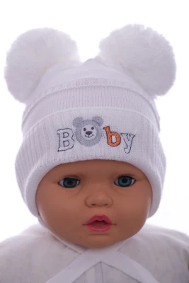 Шапка в'язка на трикотажі Бейбі біла