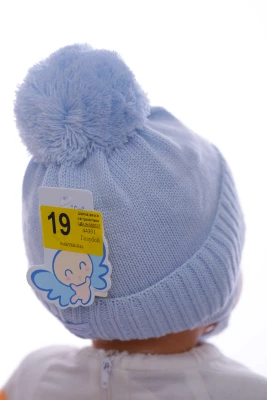 Шапка в'язка для хлопчика на трикотажі Миха блакитна