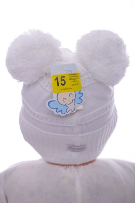 Шапка в'язка на трикотажі Бейбі біла