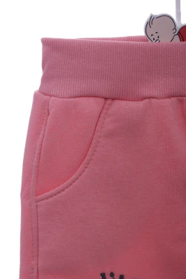 Штани на флісі для дівчинки з метеликом пудрові