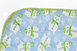 Клейонка-пелюшка для хлопчика блакитна Сніговик 50*70 см Murat Baby