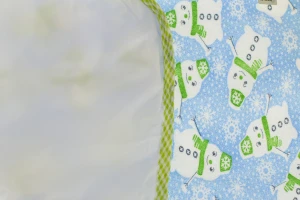 Клейонка-пелюшка для хлопчика блакитна Сніговик 50*70 см Murat Baby