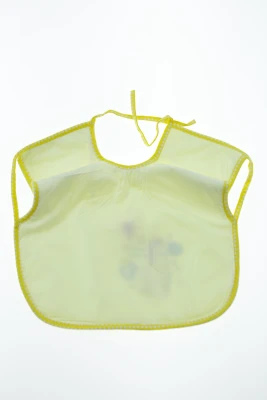 Нагрудник трикотажний на зав'язках 25*30 см Єдиноріг жовтий