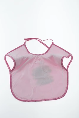 Нагрудник трикотажний для дівчинки 25*30 см Skatine рожевий