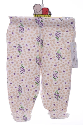 Повзунки трикотажні з бежевим квітами.