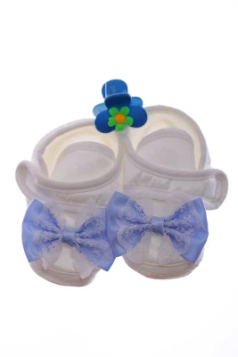 Пінетки та шапка для хлопчика трикотажні з блакитним бантом.