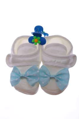 Пінетки та шапка для хлопчика трикотажні з бірюзовим бантом.