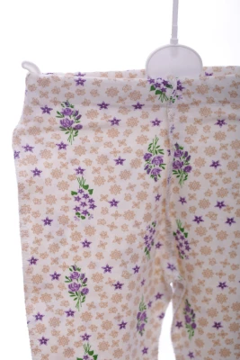 Повзунки трикотажні для дівчинки в квіточку бежеві